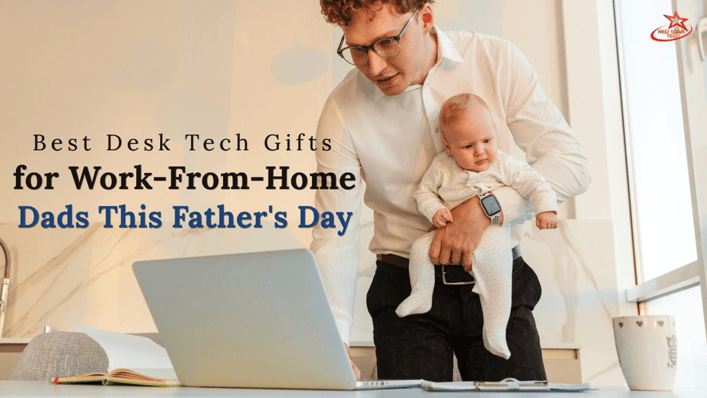 Work-from-home dad holding a baby beside a laptop with text for best desk tech gifts for dads this Father’s Day